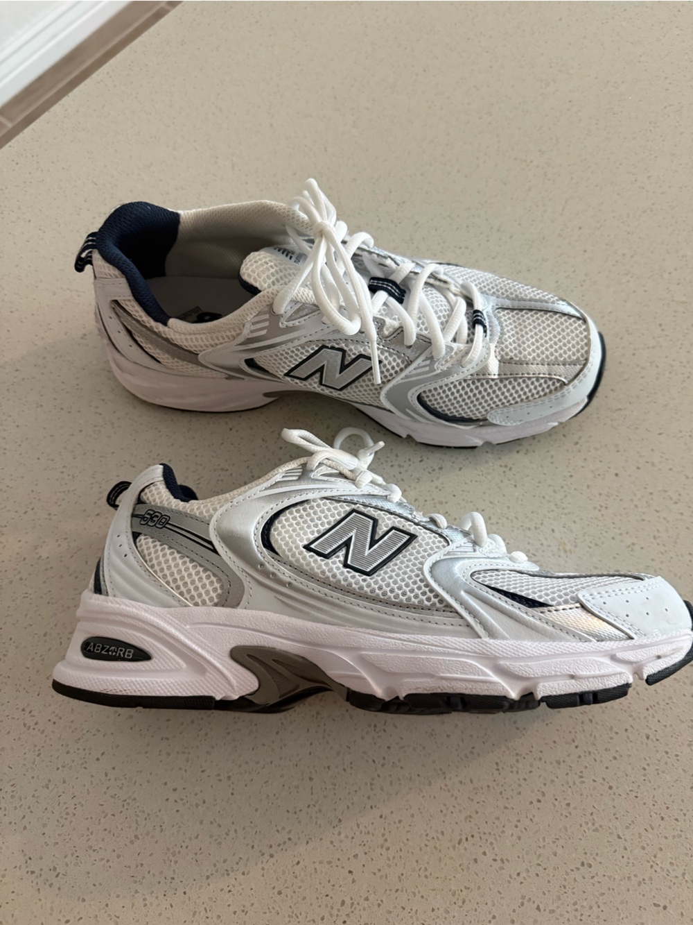 New Balance White and Navy Mesh Athletic Sneakers